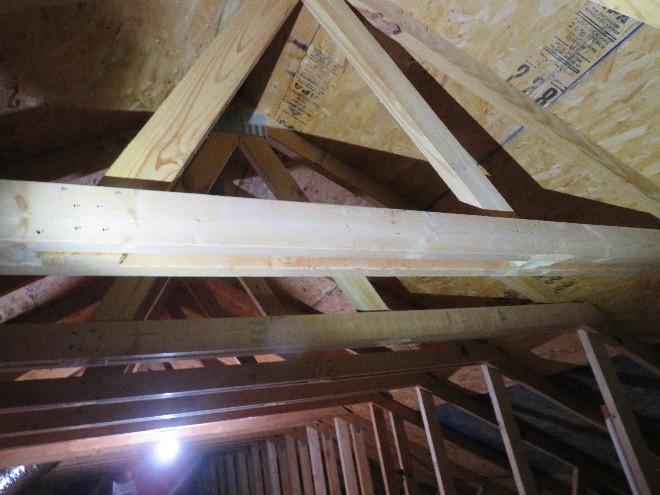 First-upon-entering-the-attic-I-really-liked-the-great-open-space-for-storage-until-I-realized-that-someone-has-cut-out-80-of-all-STRUCTURAL-trusses.-