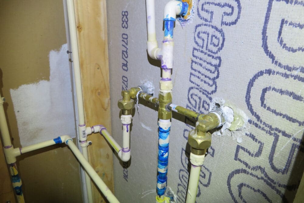 “Flip”-house-plumber-forgot-to-install-wall-support-for-the-plastic-water-supply-lines-at-the-shower