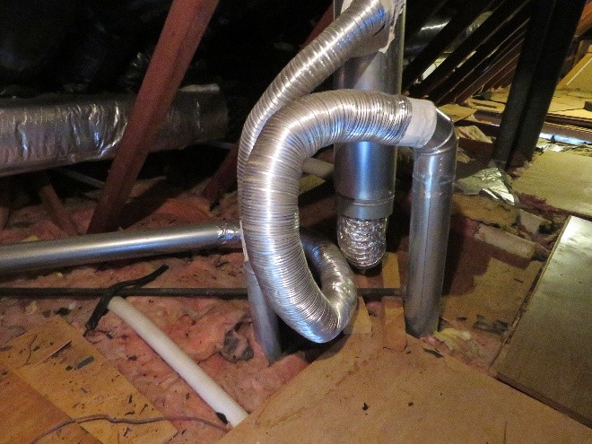 Interesting-installation-for-GAS-water-heater-vent.-Joints-are-taped-with-improper-material-and-the-vent-pipe-should-always-RISE-minimum-of-¼”-per-foot-NOT-downhill-