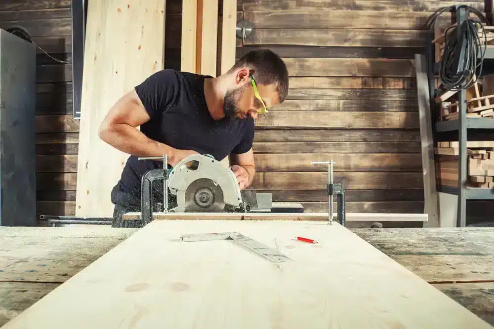 Power miter saw is used to cut baseboards. 