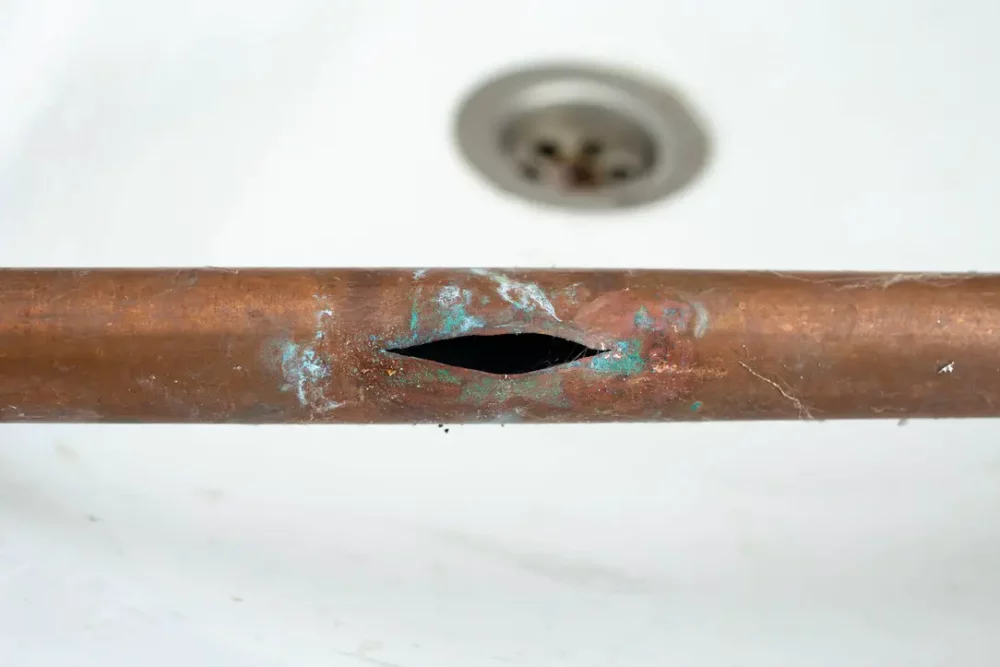 Cracked pipe as a result of a freeze in cold temperatures. 
