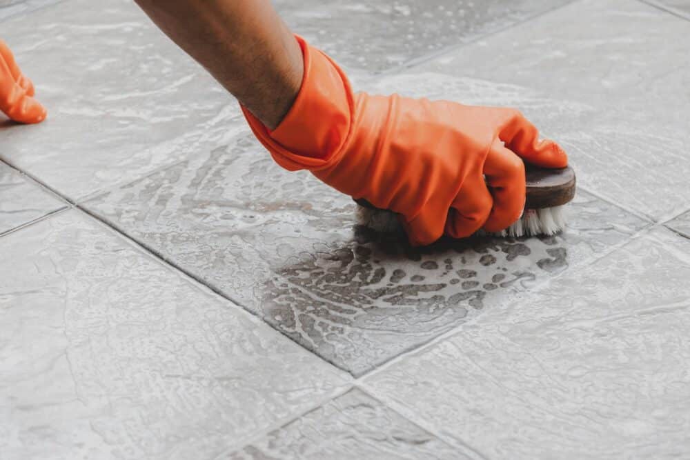 You don't always have to scrub the floor to get the tile grout clean.  There are other ways to do it and prevent it from getting dirty. 